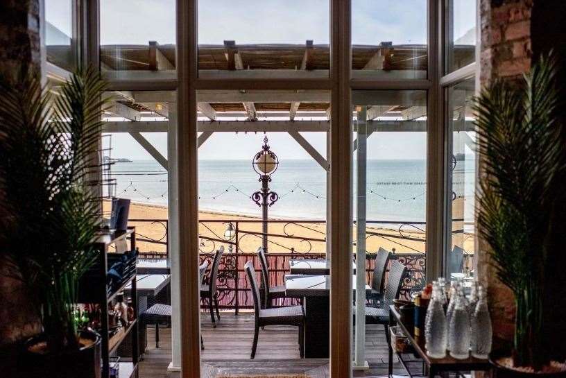 Buoy and Oyster doesn't have a rooftop bar, but the veranda looks out over Margate beach. Picture: Instagram/Buoy and Oyster