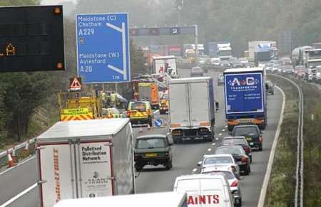 The emergency services at the scene of Friday morning's crash. Picture: BARRY HOLLIS