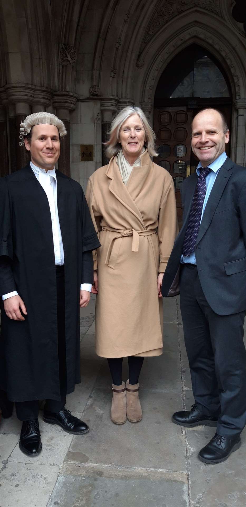 Joanna Thomson with her legal team Daniel Piccinin, left, and Paul Taylor. They are shown outside court when the judicial review was granted in March. Picture: Goodwin Sands SOS