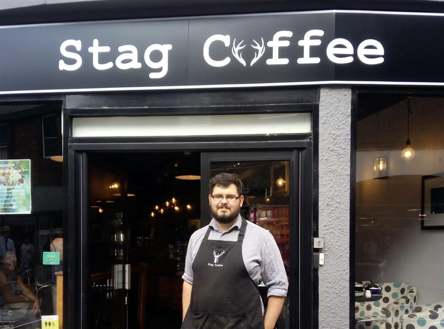 Freddie Hewett at his Stag coffee shop - now offering home grocery deliveries