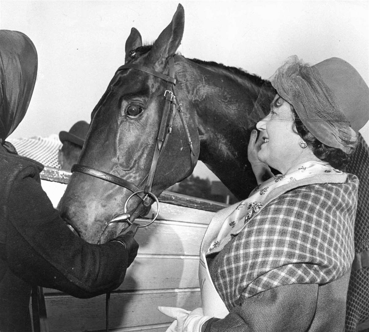 The Queen Mother during a visit to Folkestone racecourse in November 1964