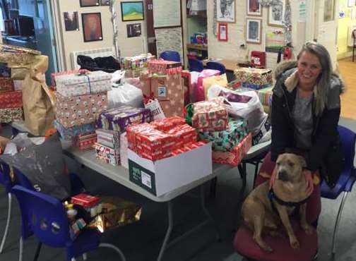 Jaymie Dunster delivered more than 60 shoeboxes and dog treats to the Catching Lives homeless shelter in Canterbury on Christmas Eve