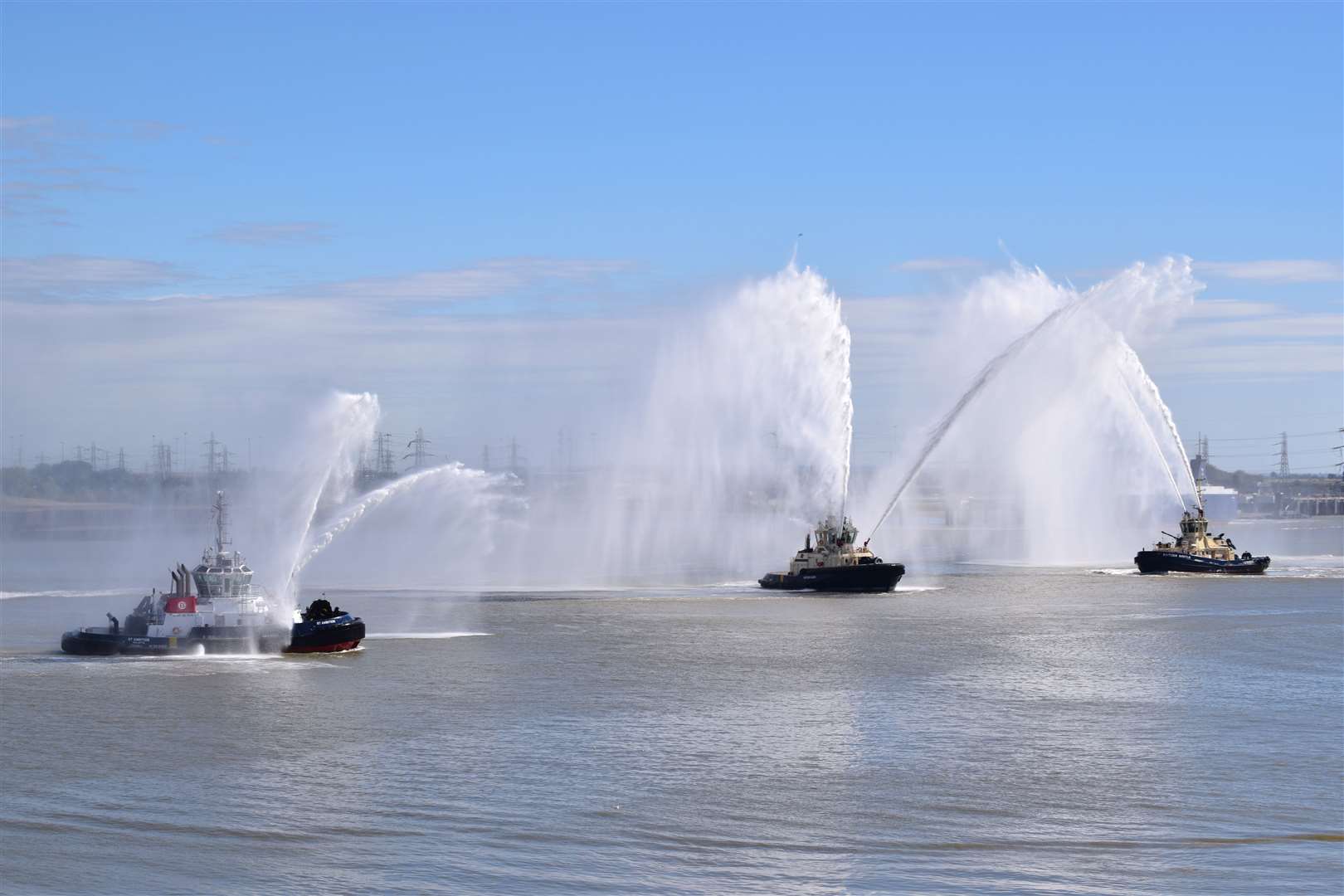 Multiple tugs from the Gravesend RNLI and Svitzer performed the water show. Picture: Fraser Gray