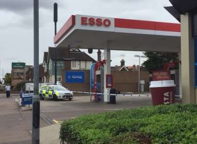 The Esso garage sealed off by police