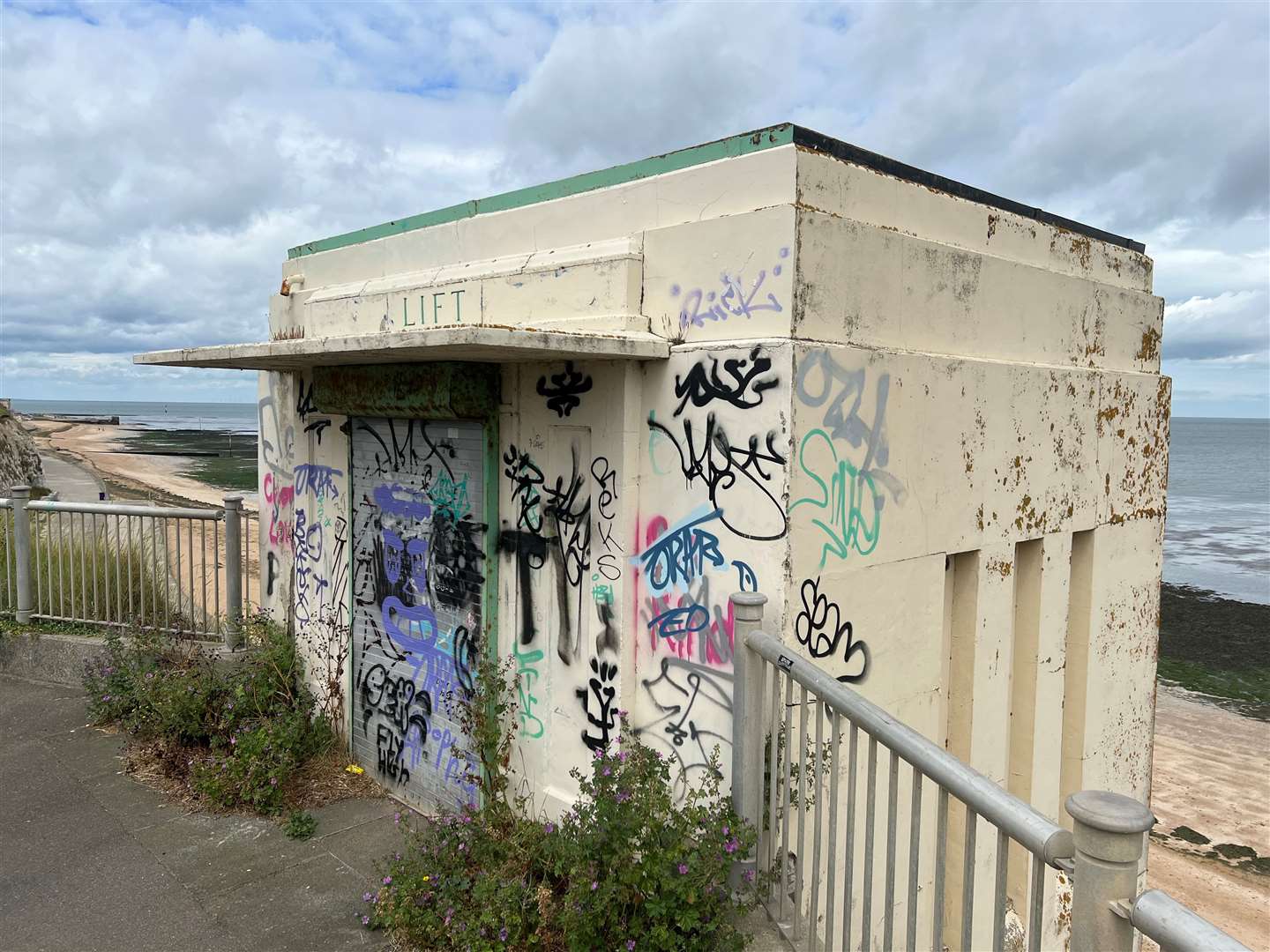 The clifftop access to the art deco lift at Walpole Bay - long since left for weeds and graffiti