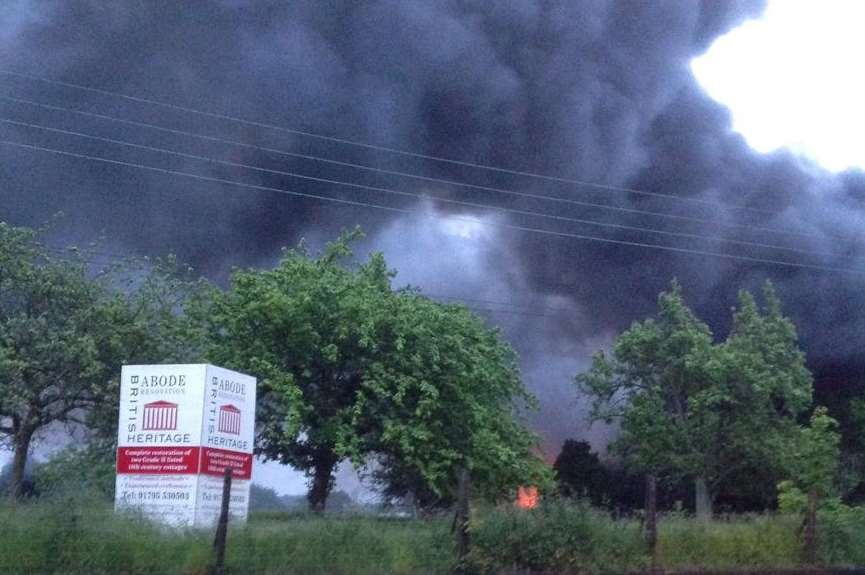 Smoke billows into the sky during a large fire at Faversham Linen Services