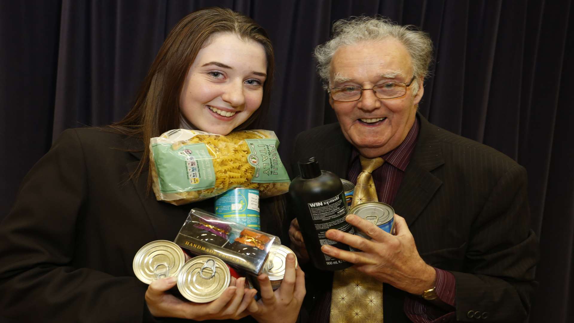 Regan Goodwin from Maidstone Grammar School for Girls with Mike FitzGerald, trustee for Maidstone Homeless Care