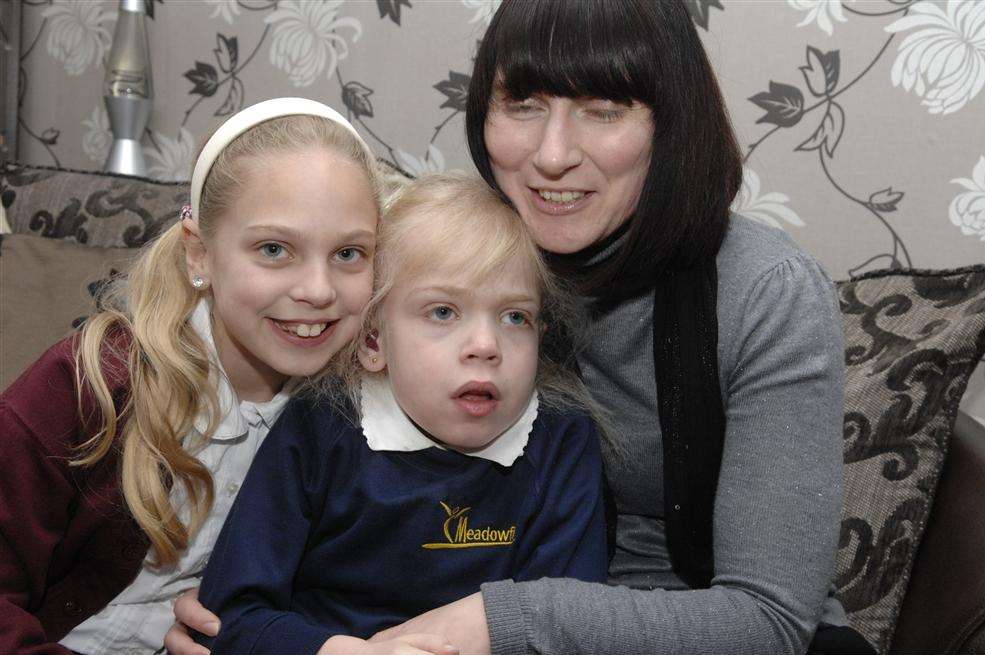 Lily Brooker, centre with sister Paige, 10, left and mum Michelle of Donemowe Drive, Kemsley