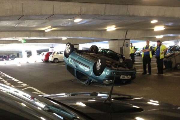 The car on its roof at Bluewater