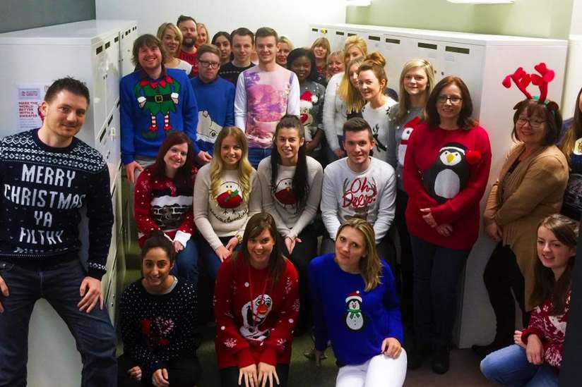 Staff at Schools' Personnel Service in Kings Hill with their festive jumpers