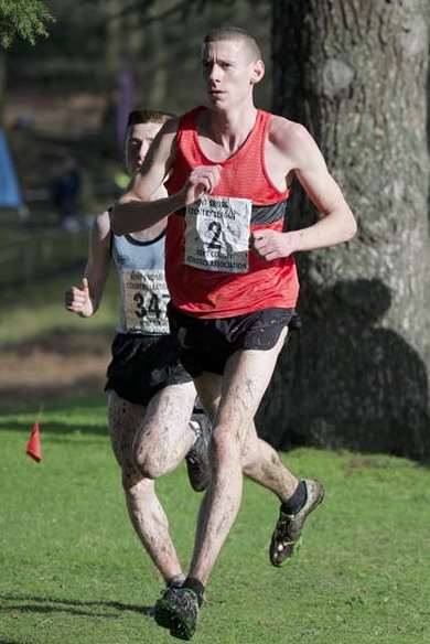 Tom Collins on his way to a first Kent Cross-Country League title. Picture: Andy Payton