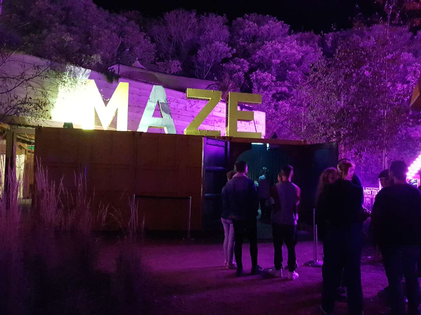 Guests queue for the Upside Down maze