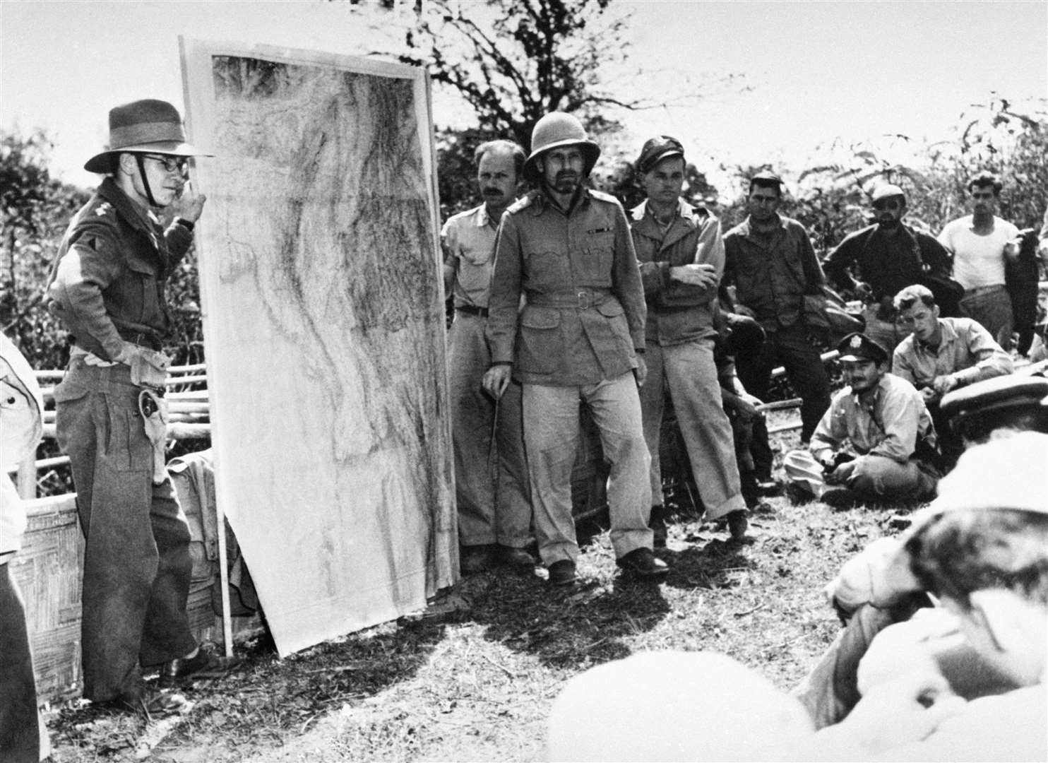 General Orde Wingate (wearing pith helmet), commander of the Chindits, briefs members of the 1st Air Commando, USAAF, in what was then Burma (PA)