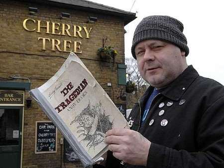 Andy Fraser holds his book The Tragedian outside The Cherry Tree Pub in Tonbridge Road, Maidstone. Picture: MATTHEW WALKER