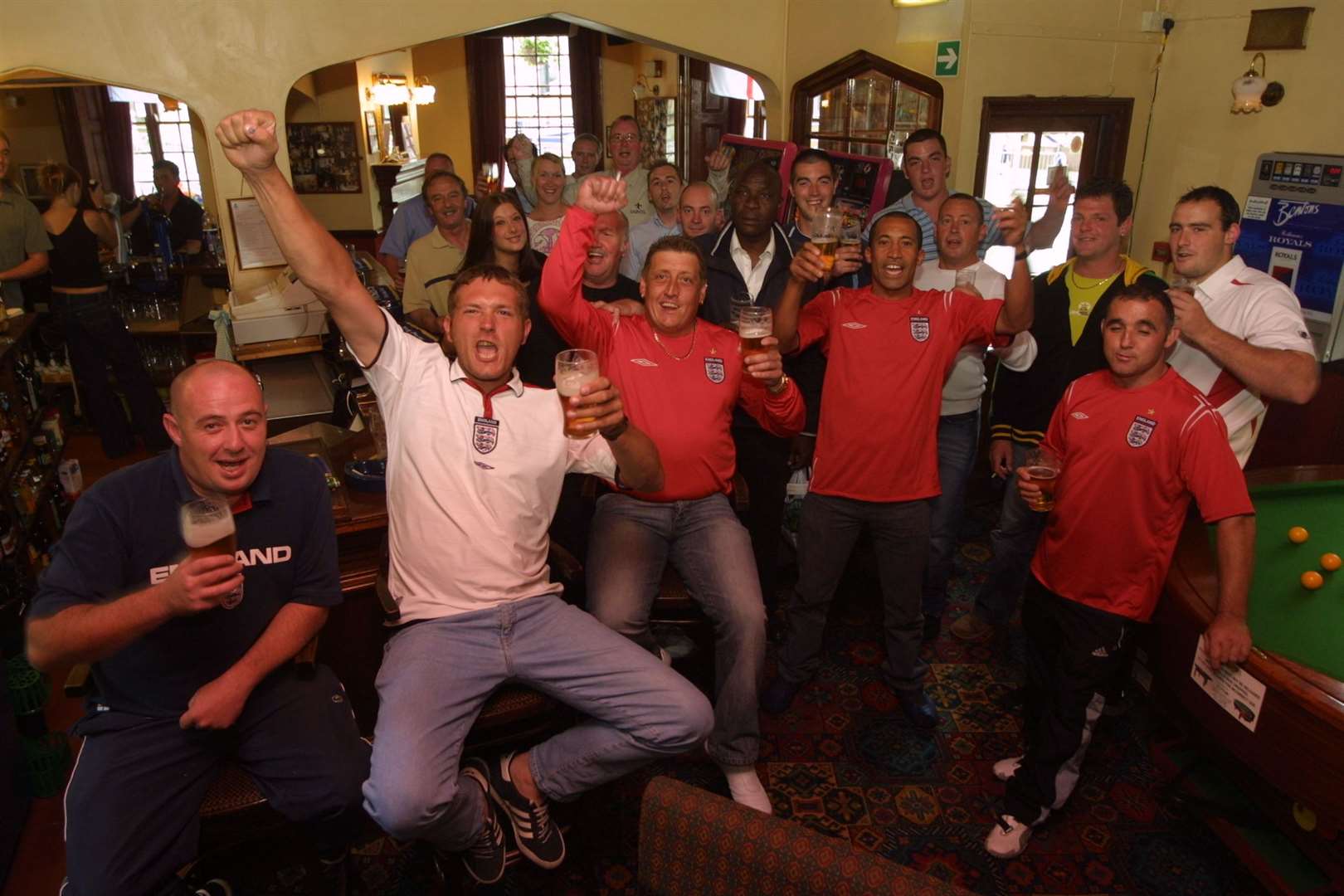 As the crowded Farmers Pub in Sevenoaks was threatened with closure in June 2004, fans of the pub gather to show their support - and watch England in the Euros. Sadly, it shut two years later. Picture: John Westhrop