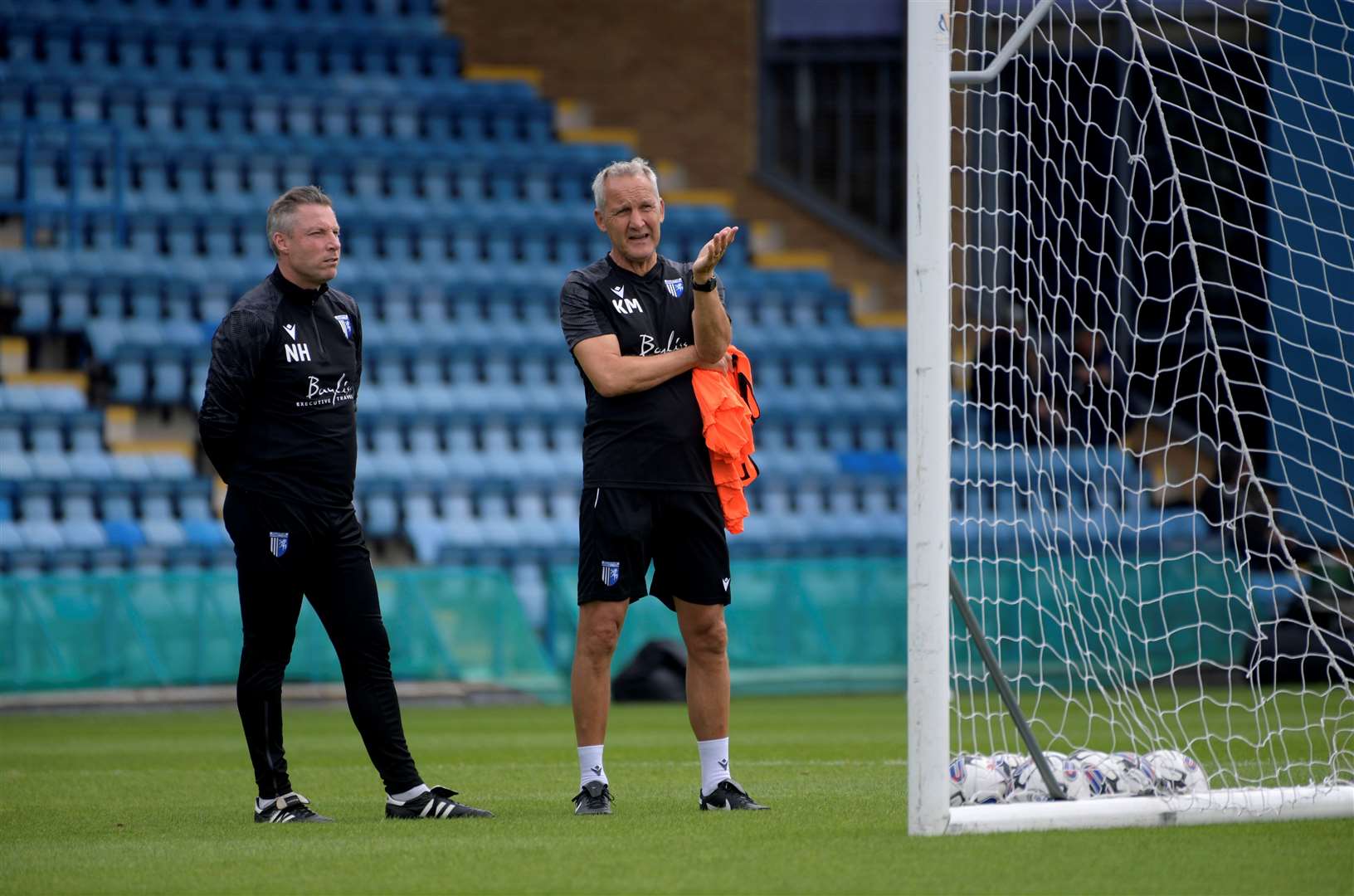 Gillingham manager Neil Harris with head of academy coaching Keith Millen Picture: Barry Goodwin