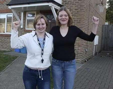 HEROINES: Suzanne Beeching and Kelly Bradfield on their now happy street. Picture: BARRY CRAYFORD