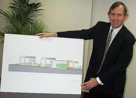 MID Kent College principal John Levett with a plan of the proposed new campus at Lower Lines, Chatham.