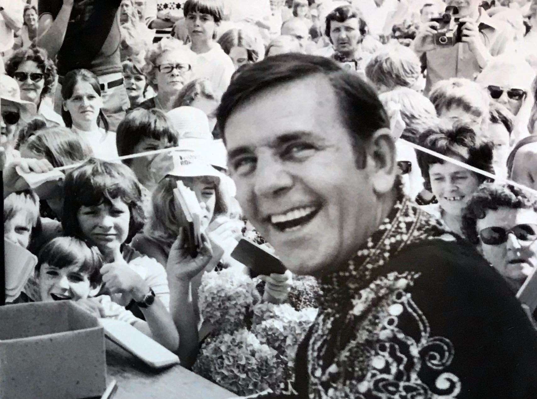 Norman Wisdom and kids on a visit back to Deal. Picture: Basil Kidd