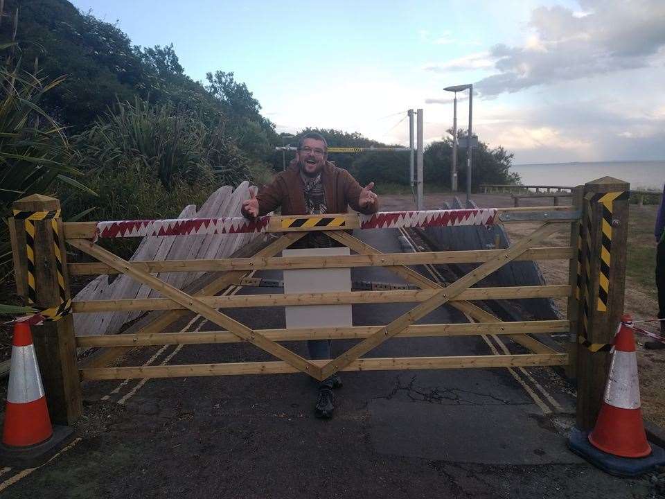 Cllr Tim Prater with the new gate at the Lower Leas Coastal Park, which was installed by the council. Picture: Cllr Tim Prater