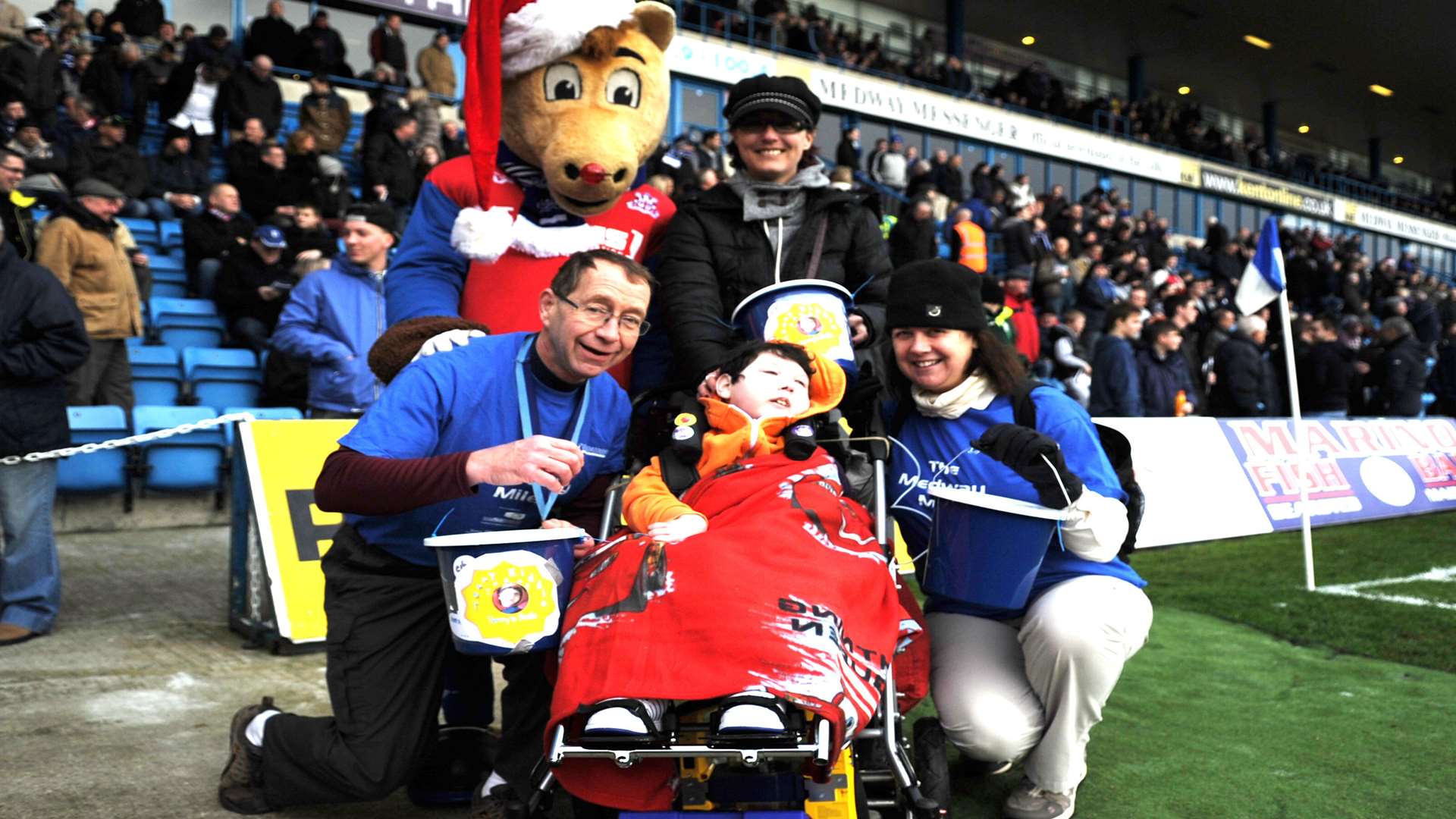 Medway Mayor Cllr. Vaughan Hewett with Terry at Gillingham FC's boxing day match in 2012.