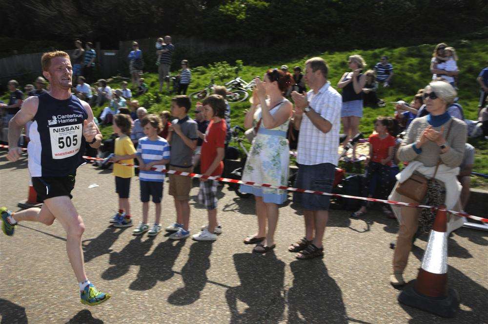 Crowds cheer home the winners in the Whitstable 10k