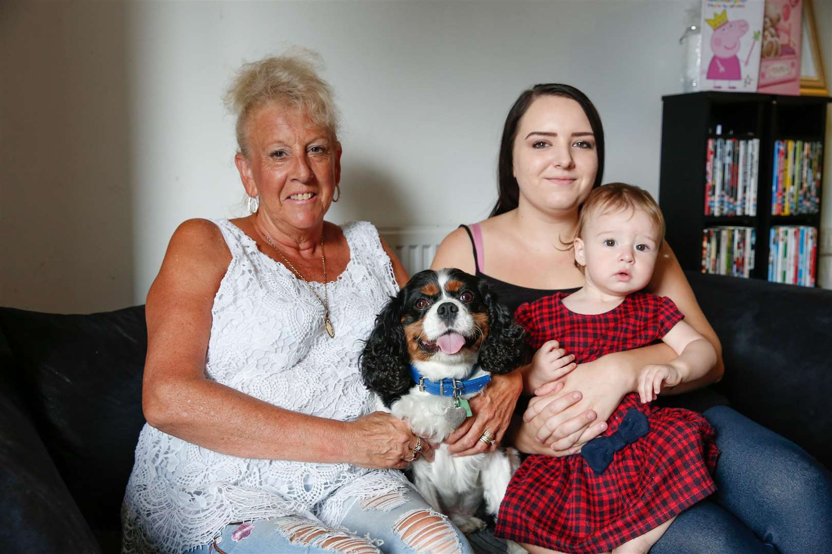 Shannon Weeks with daughter Chloe Showell, 1, and great grandmother Maureen Tarrant. Their dog Louie the King Charles Cavalier raised the alarm by barking