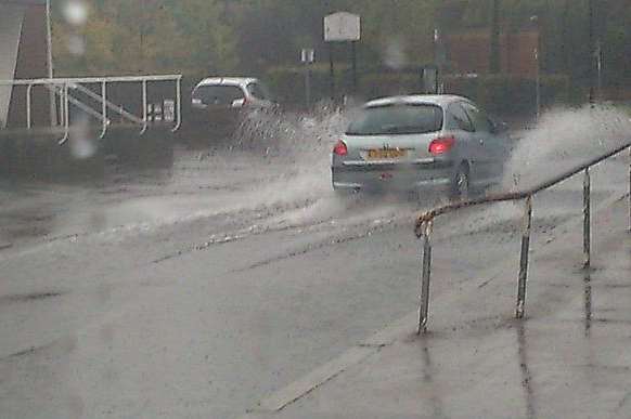Bradford Street in Tonbridge is under inches of water this morning. Picture: @JustJane1963