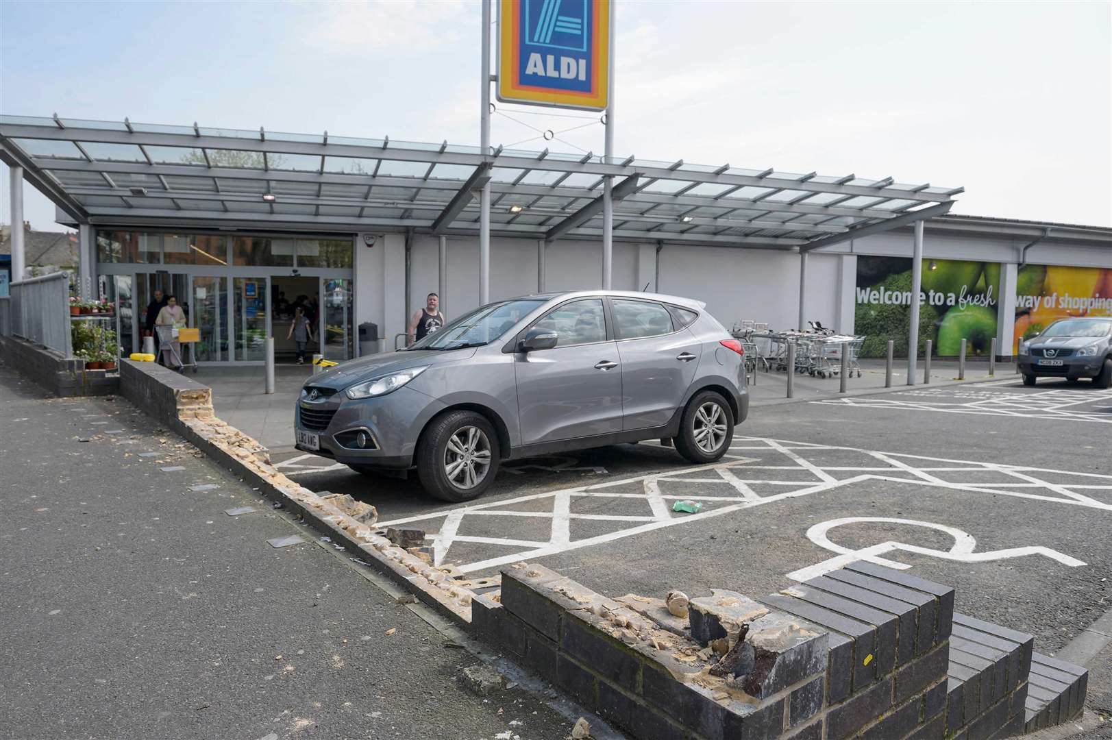 A man was taken to hospital after the crash at Aldi