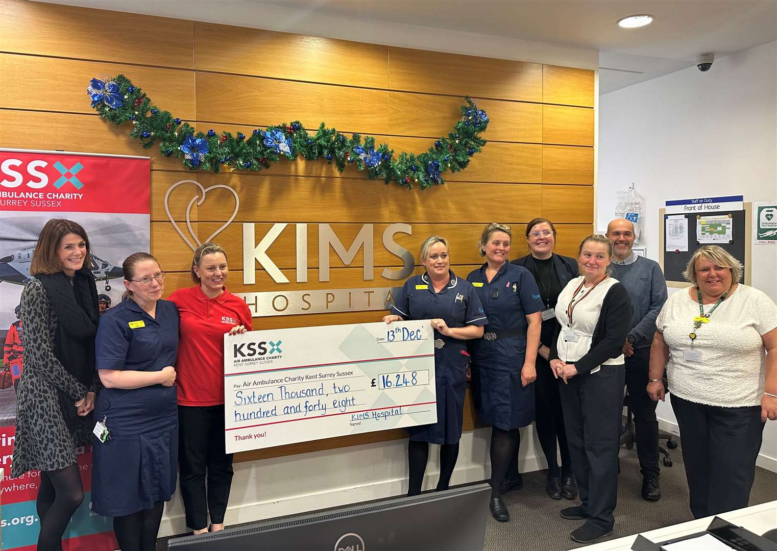 Kent, Surrey and Sussex Air Ambulance Service were presented with a cheque for £16,248. Picture: KIMS Hospital