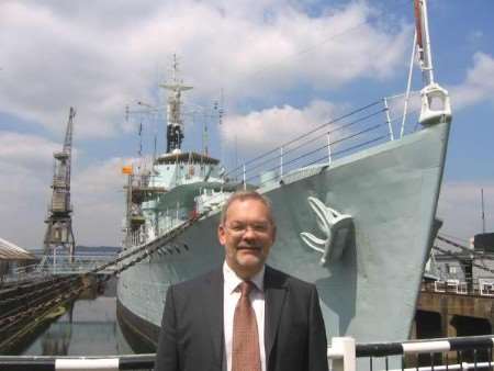 Charlie Bean beside HMS Cavalier at Chatham Historic Dockyard