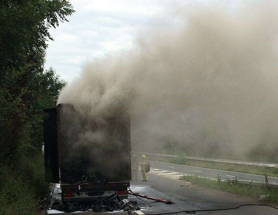 The lorry has been gutted by fire. Picture: @kentpoliceroads