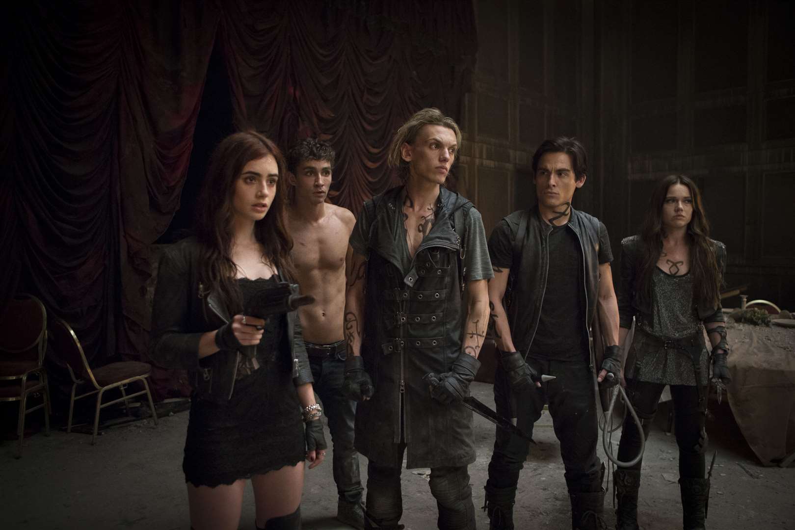 Lily Collins as Clary, Robert Sheehan as Simon, Jamie Campbell Bower as Jace, Kevin Zegers as Alec and Jemima West as Isabelle in The Moral Instruments: City Of Bones. Picture: PA Photo/Entertainment One.