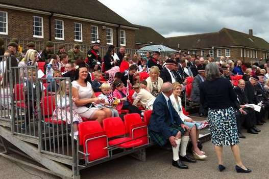 Families of 5 SCOTS soldiers await the Queen's arrival