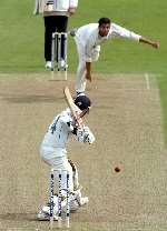 Amjad Khan toils against Durham centurion Gordon Muchall. Picture: MATTHEW WALKER