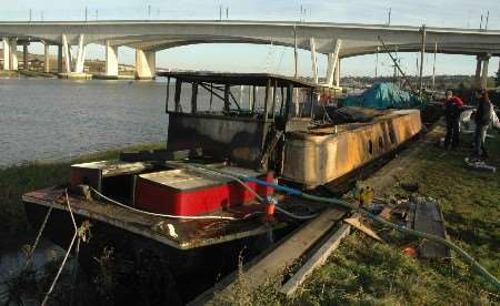 The damage to the moored houseboat. Picture: VERNON STRATFORD