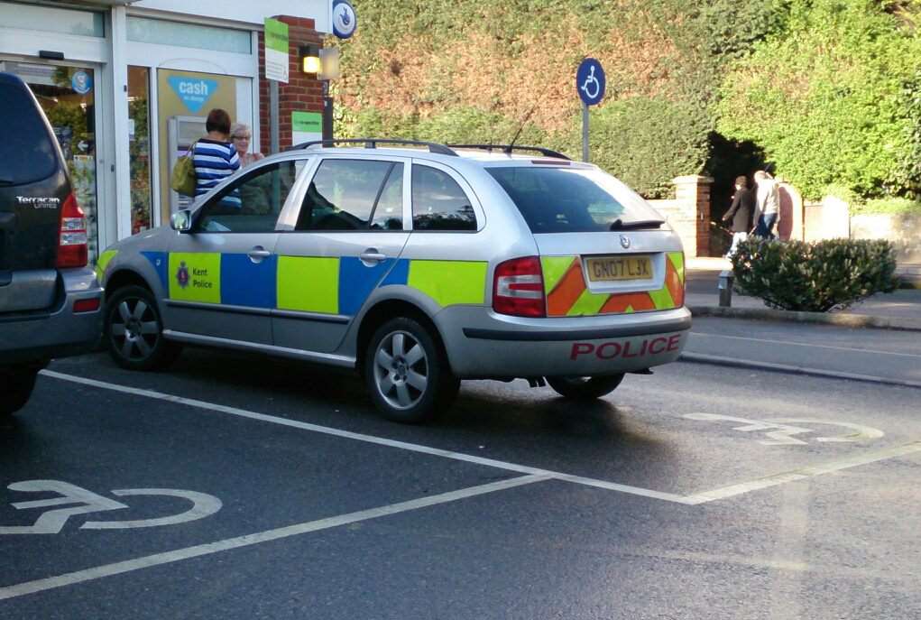 The offending police car, which was parked in a disabled pay outside the Co-Operative in Kennington