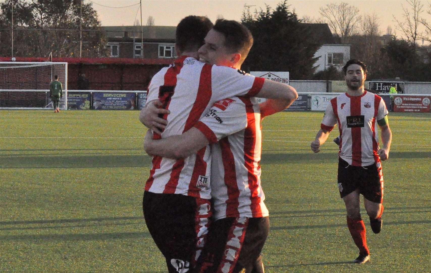 Sheppey striker Jake Embery is congratulated by team-mate Danny Leonard. Picture: Paul Richards