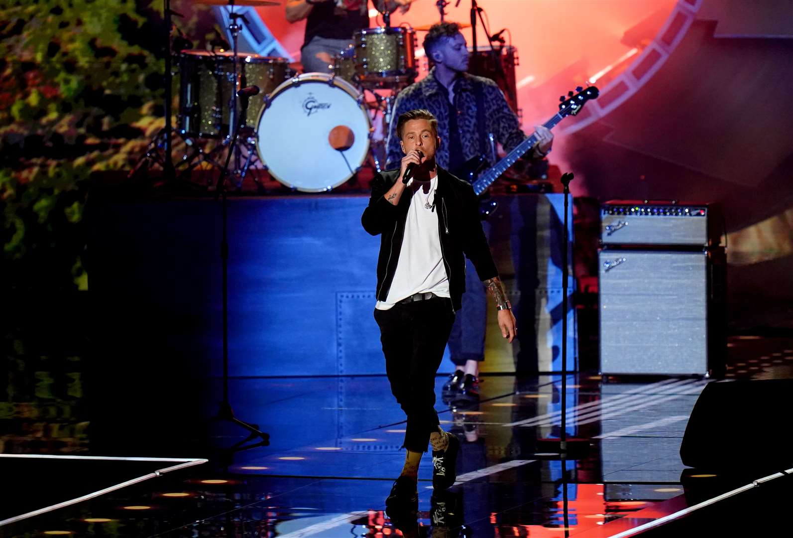 Ryan Tedder of OneRepublic performs on stage (Ian West/PA)