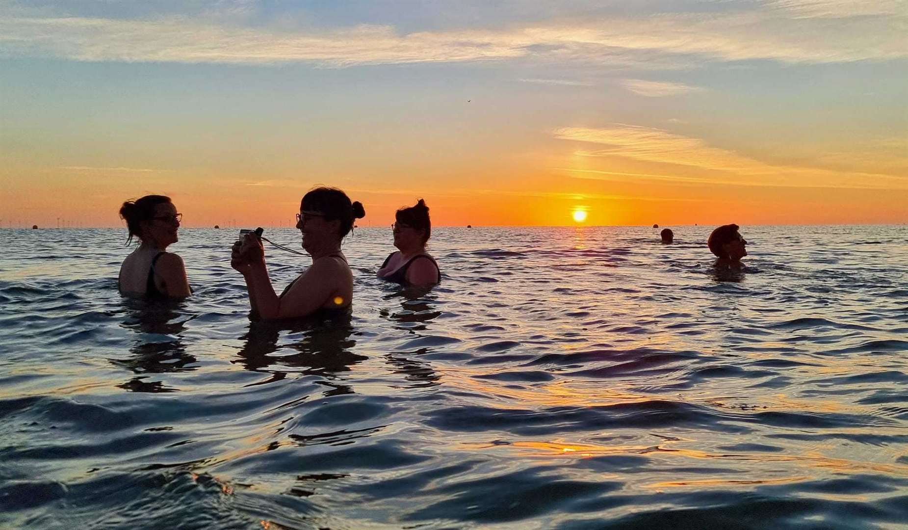 Whitstable swimming group Bubbletit Bluetits organised a Summer Solstice swim this morning. Picture: Miriam Simmons (Instagram: @miriamsimphotography)