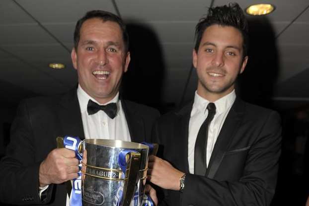 Martin Allen and son Charlie Allen with the League 2 trophy