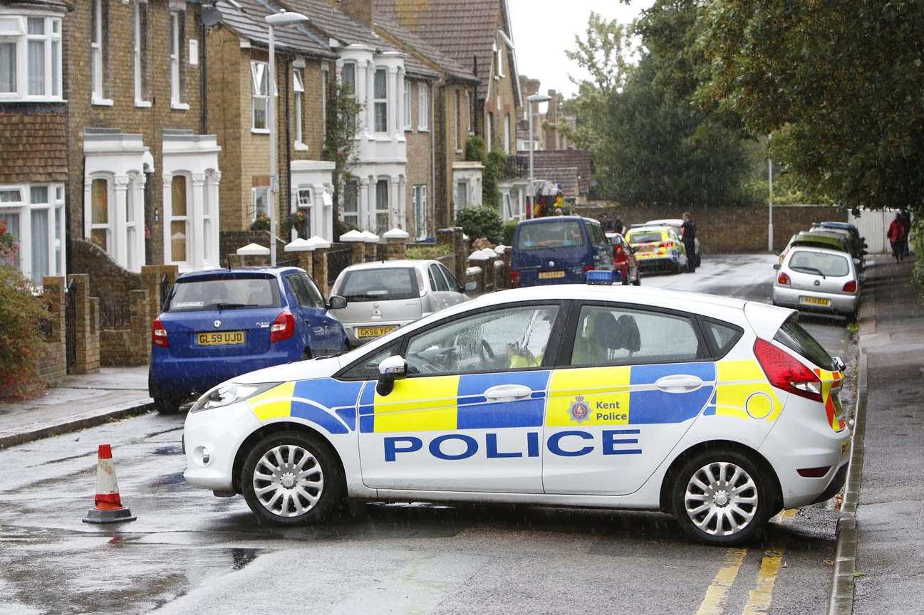 Police closed Albany Road during the rooftop stand-off. Picture: Matthew Walker