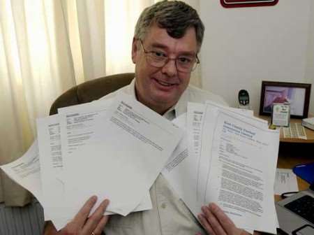 Canterbury FC secretary Keith Vaughan with some of the emails he's received in support of the club. Picture: GERRY WHITTAKER