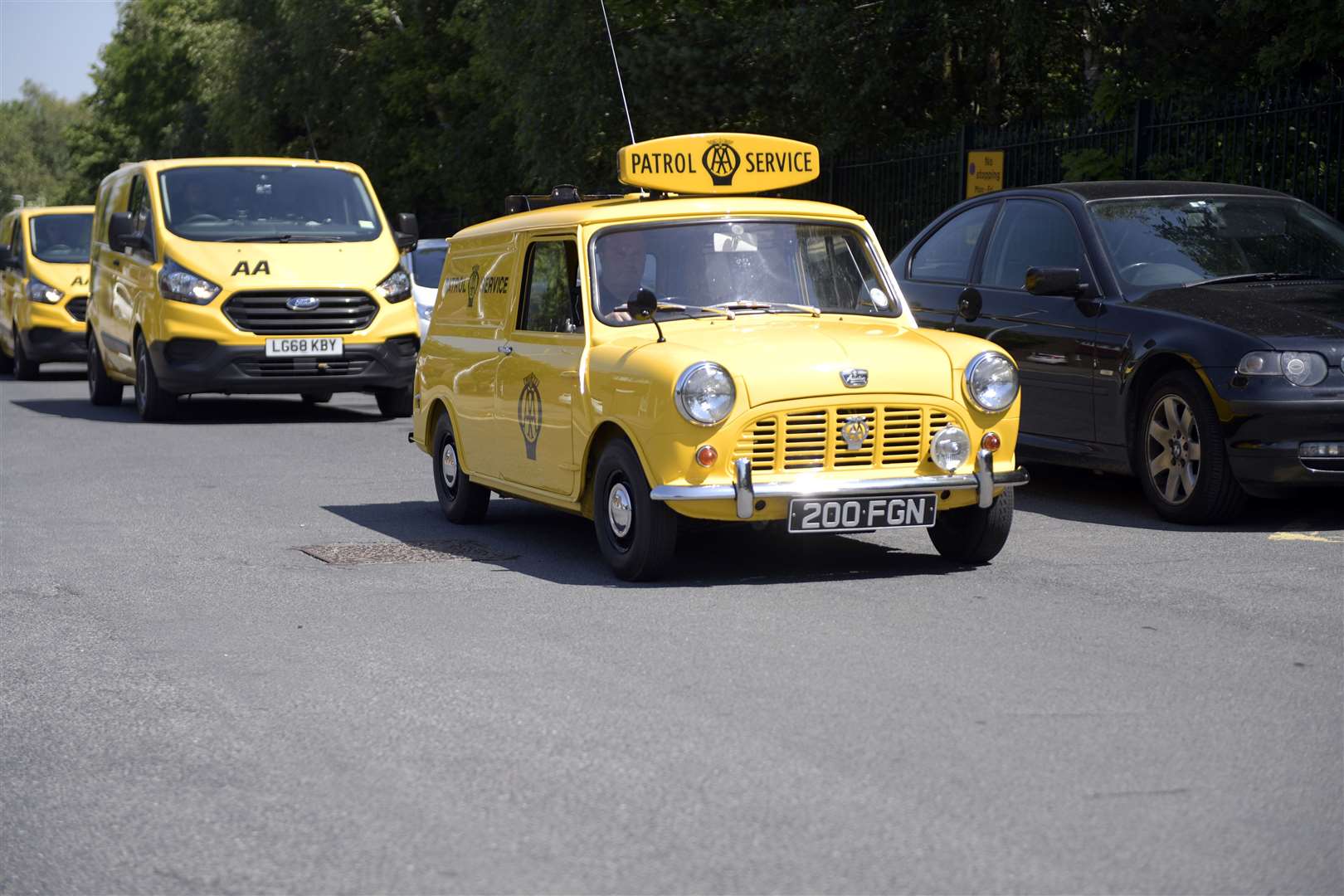 Vans through the ages joined in tribute to the former AA mechanic. Picture: Barry Goodwin