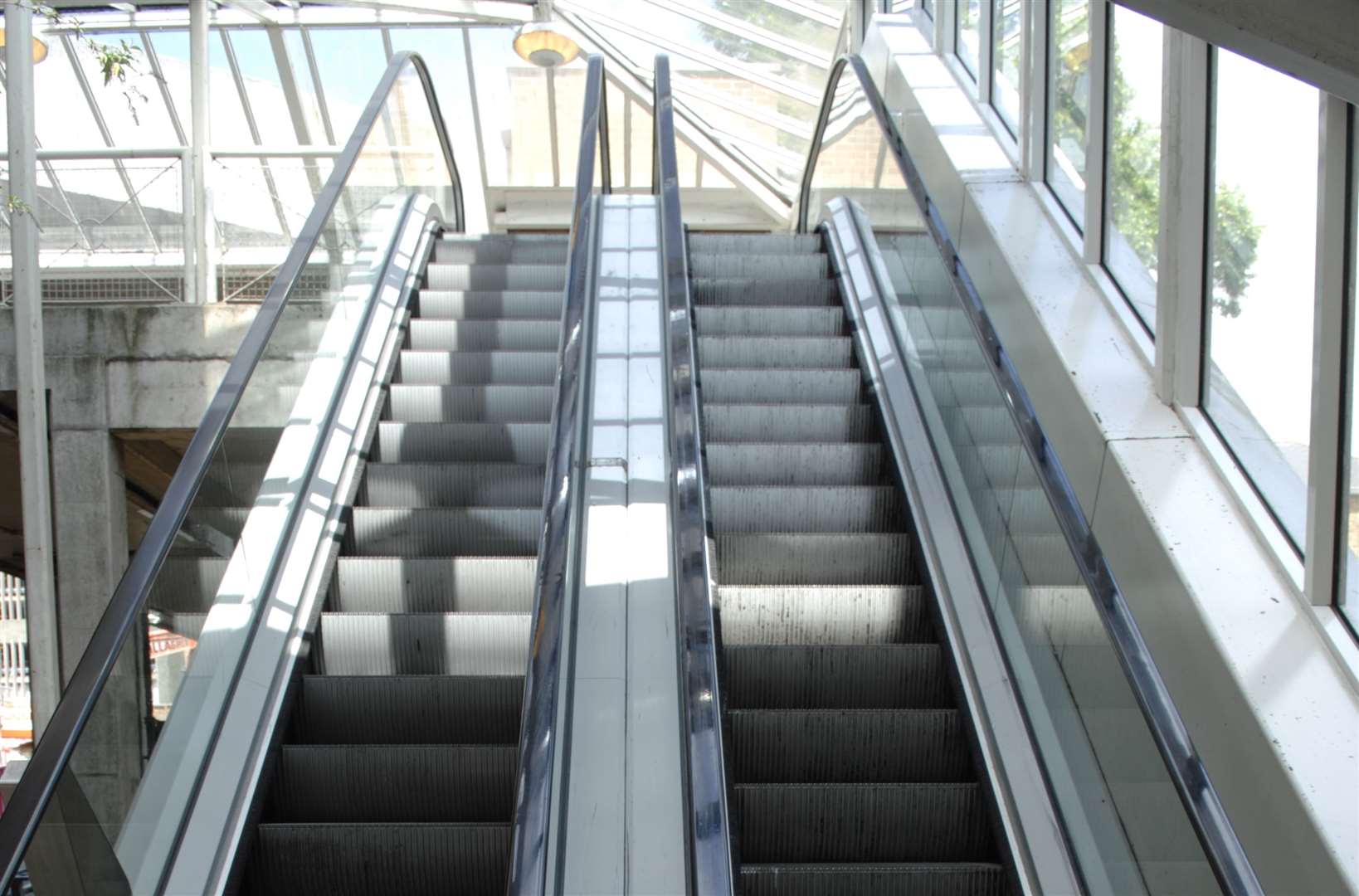 The escalators linking The Mall Shopping Centre to Sainsburys at Romney Place. Photography by Matthew Walker (36447518)