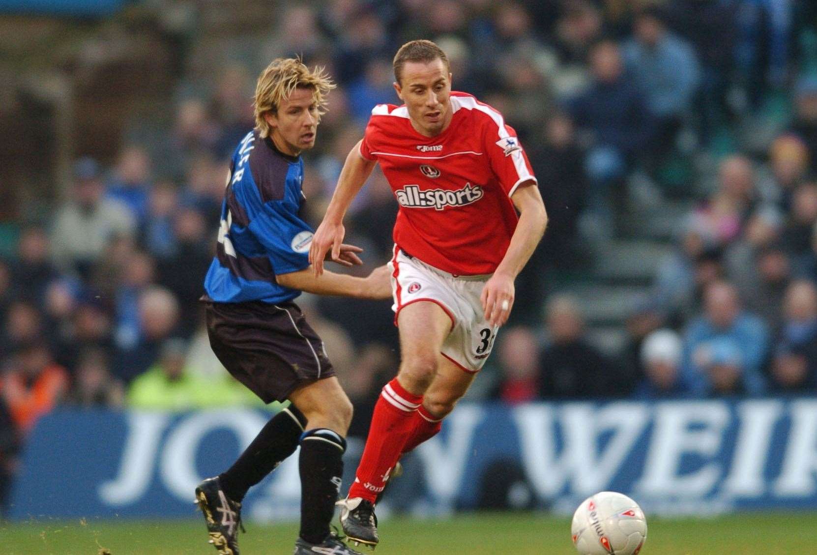 Gillingham's Danny Spiller and Charlton Athletic's Chris Perry