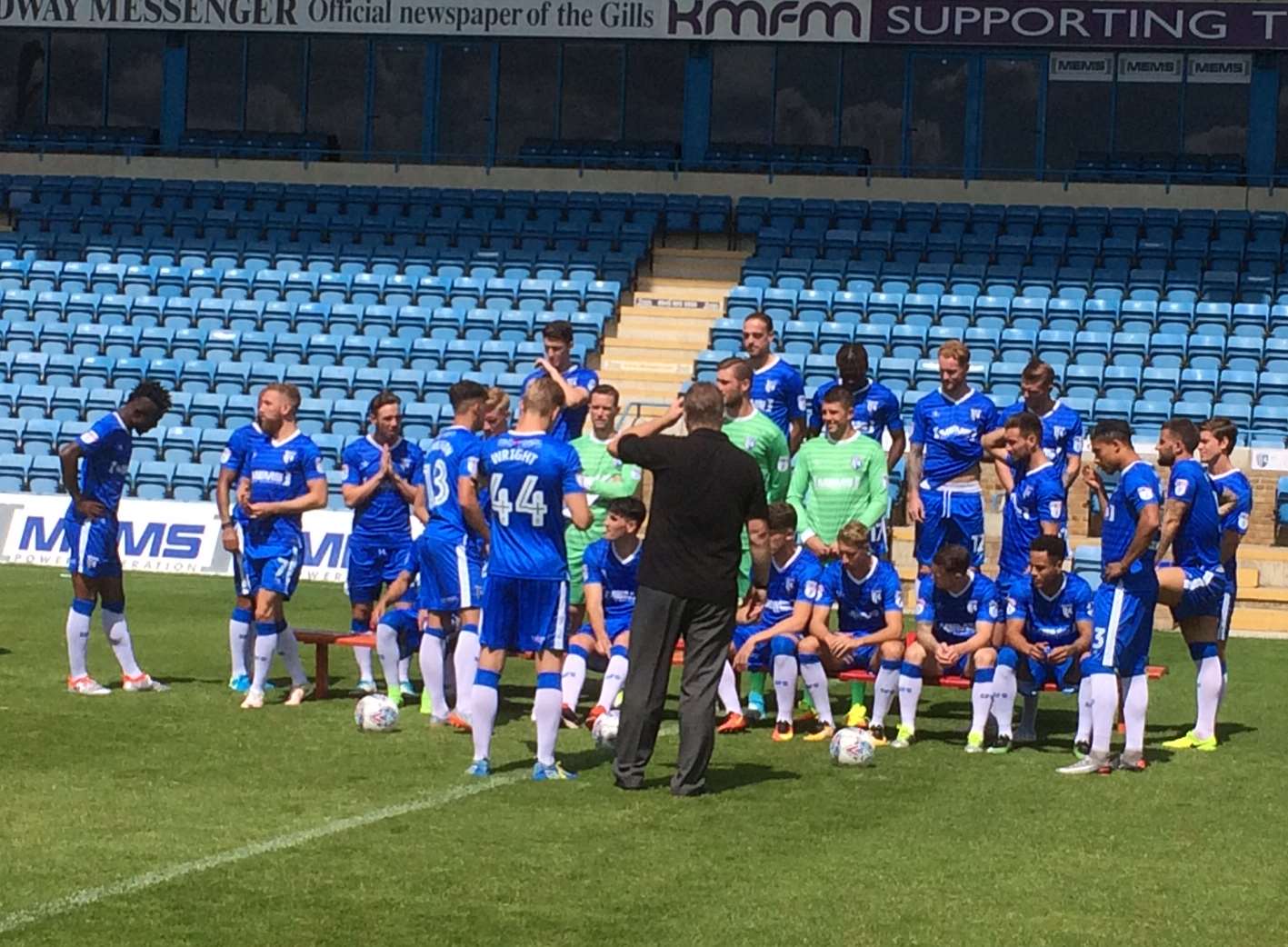 Josh Wright getting the Gills team in position for the picture