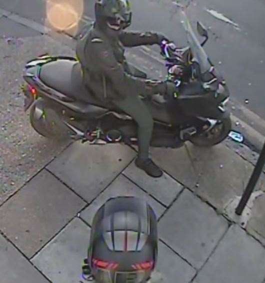 Police want to speak to this man with a 'distinctive moped helmet'. Picture: Kent Police (8767353)