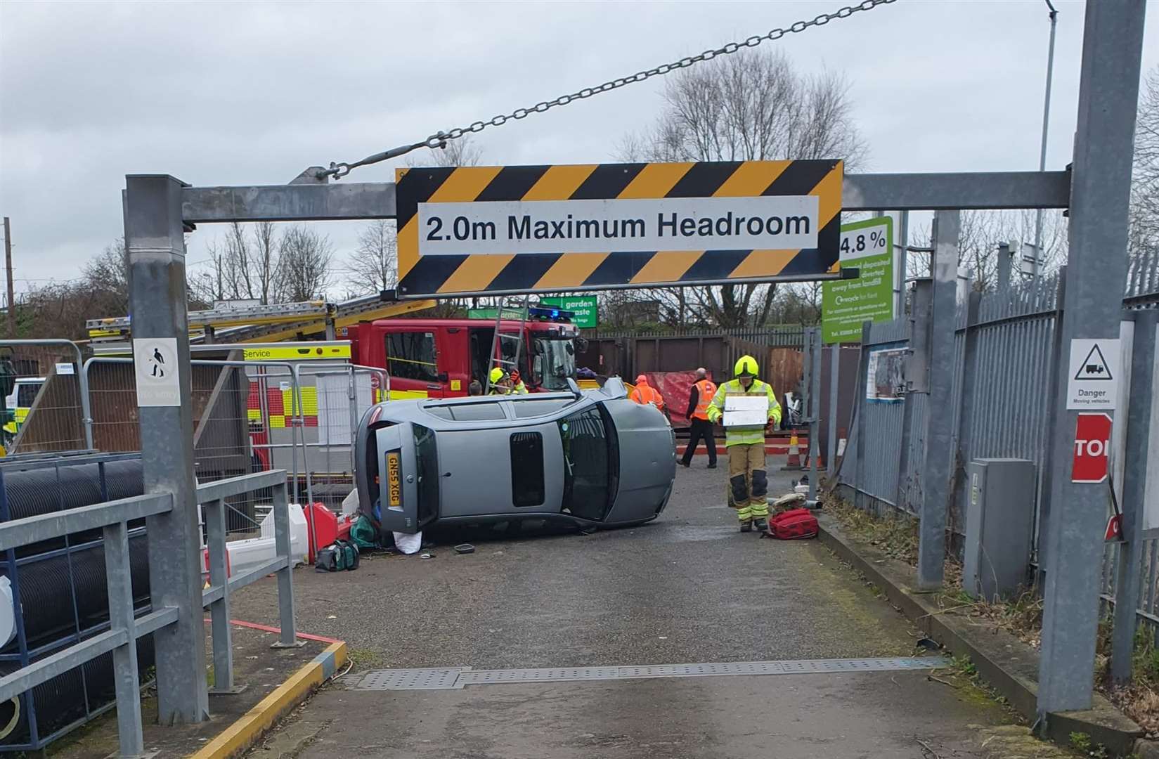 A car has flipped inside Deal Household Waste Recycling Centre