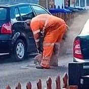A council worker came to repair the pot holes in Cowper Road, Sittingbourne